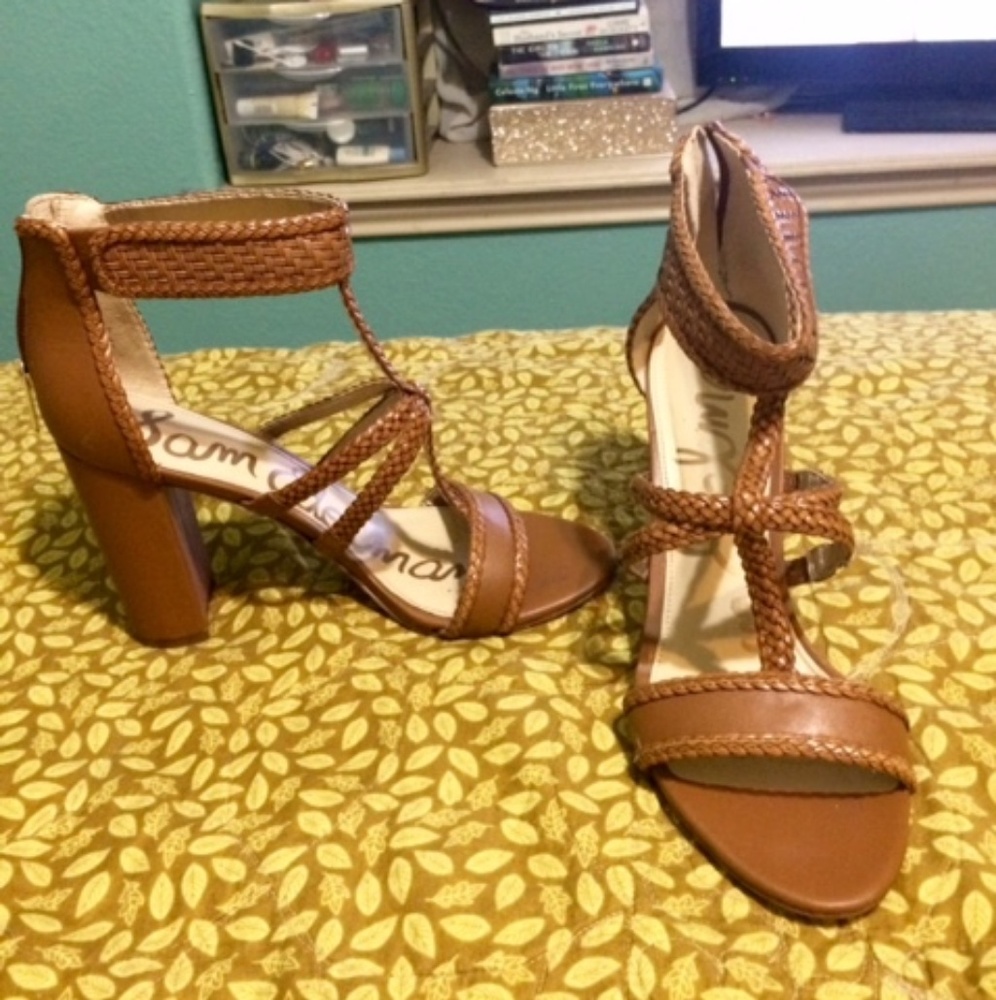 Braided leather sandals with chunky heel.